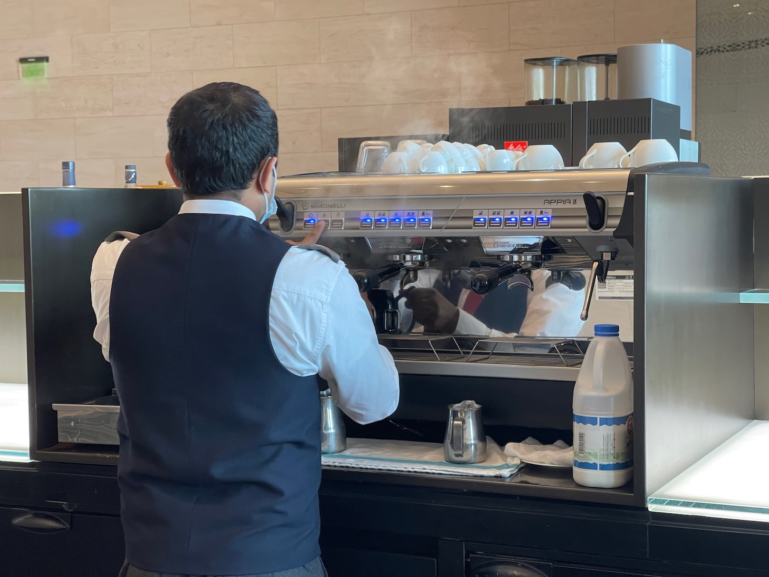 a man making a coffee