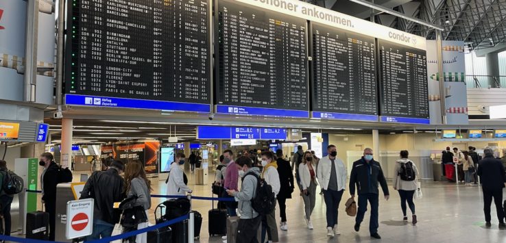 a group of people in a terminal