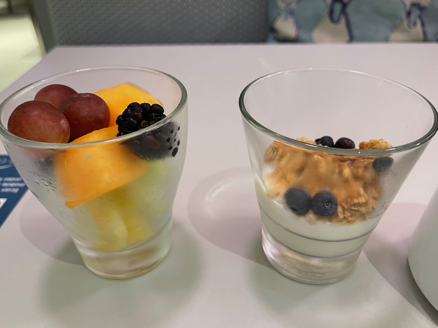 two glasses of fruit and yogurt