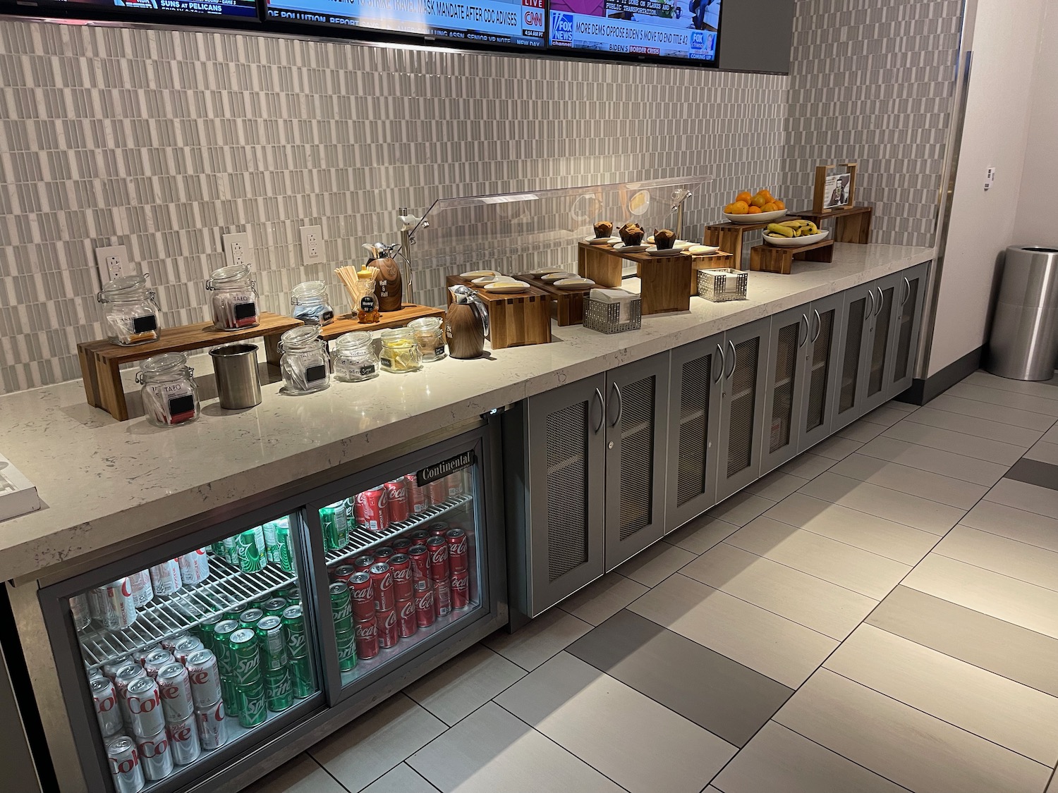 a counter with drinks and beverages