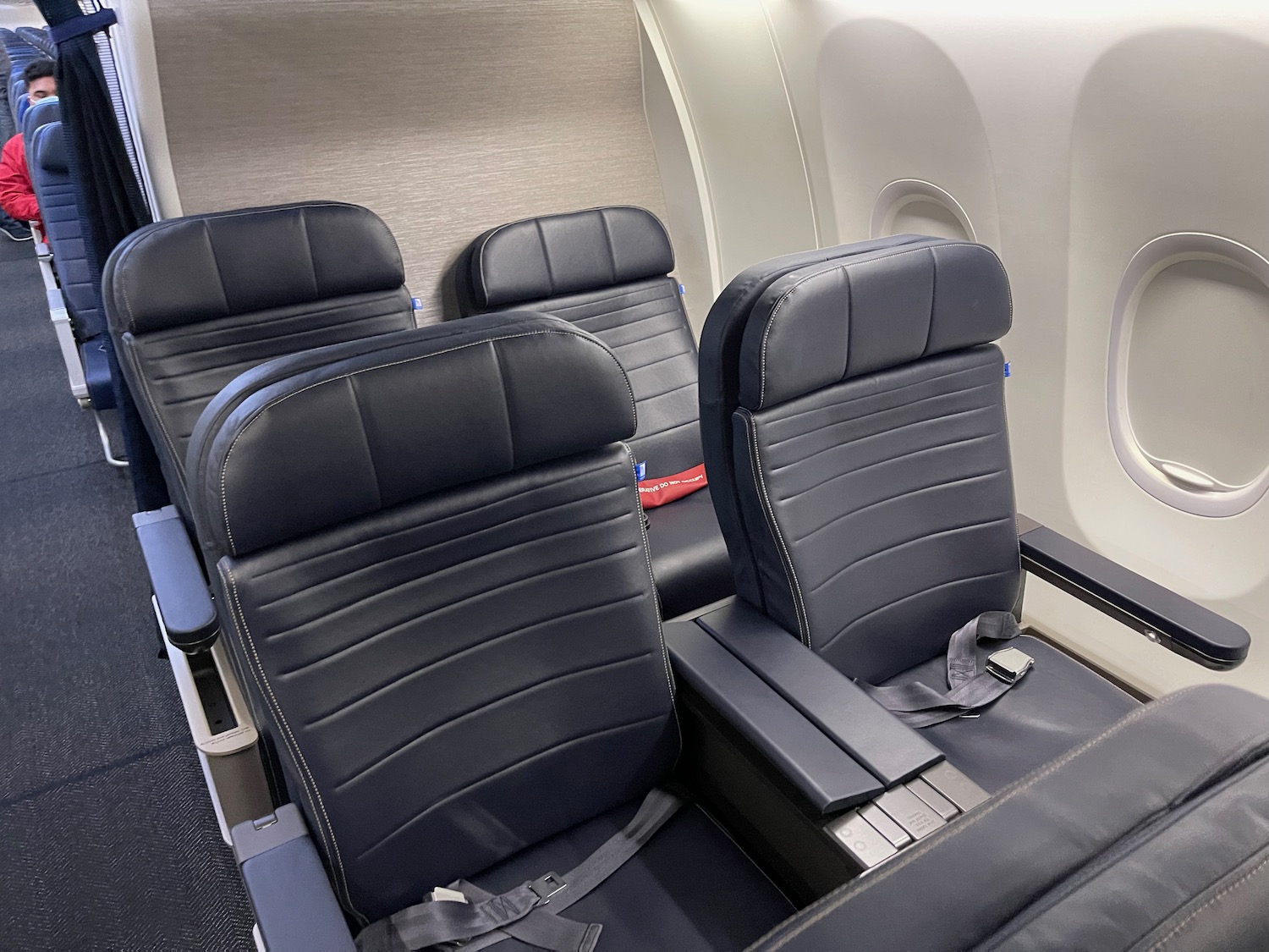 a black leather seats in an airplane