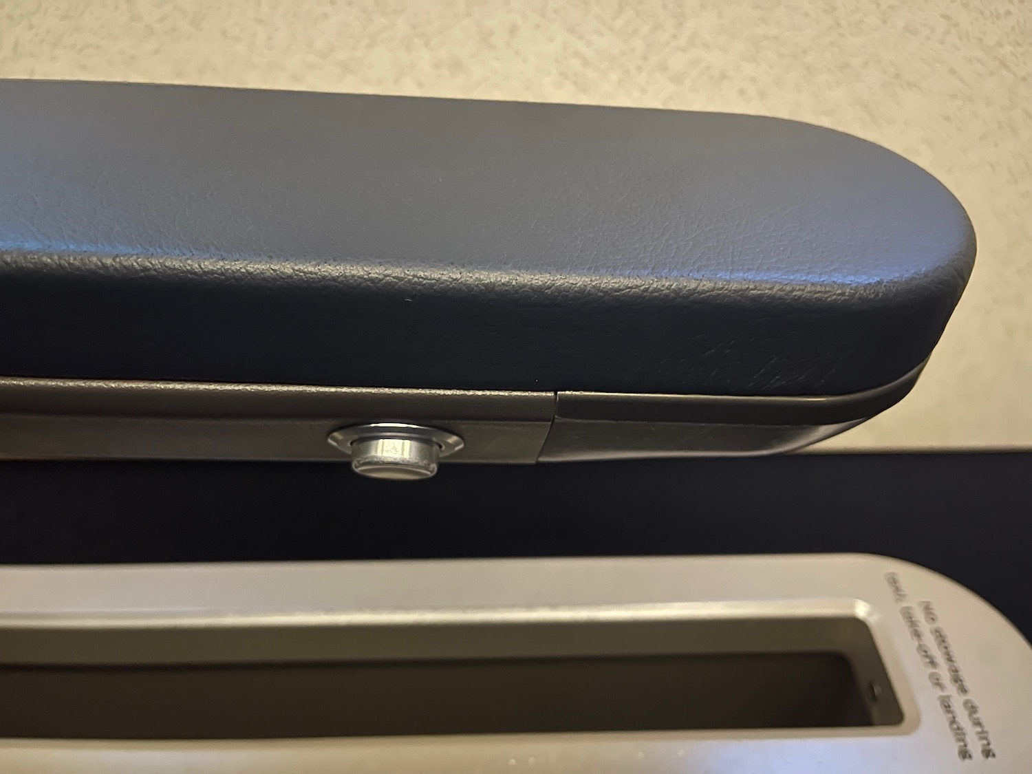 a black case with a round button