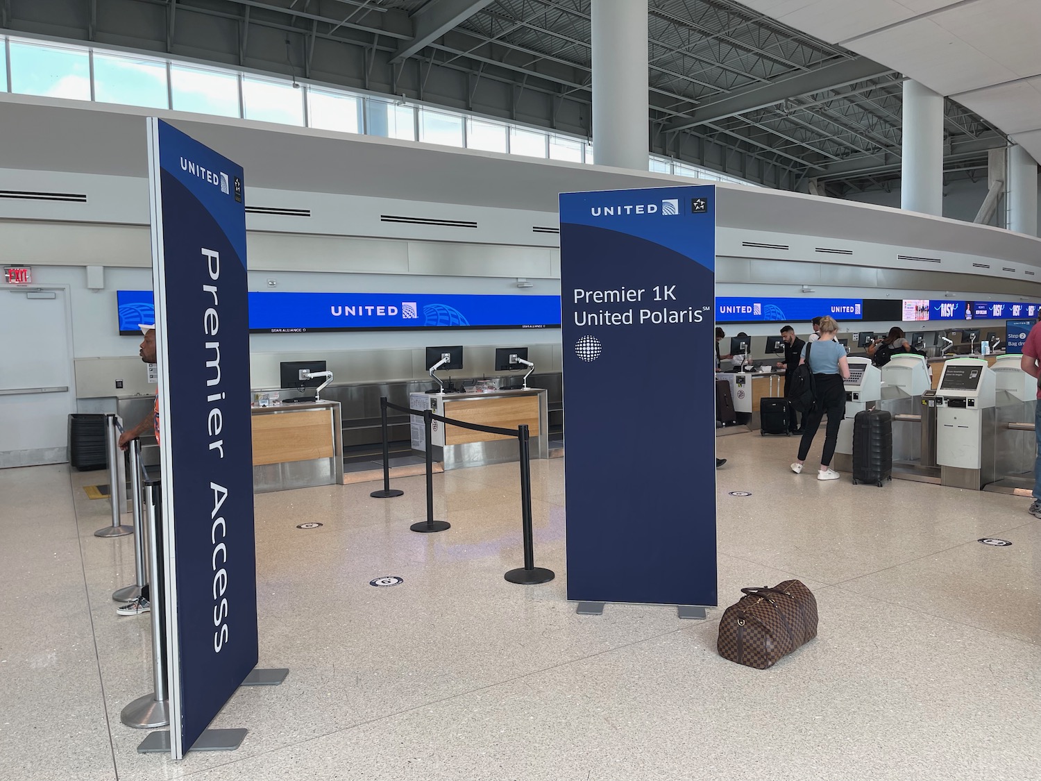 a group of people in an airport