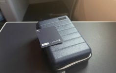 a blue case with a card on top