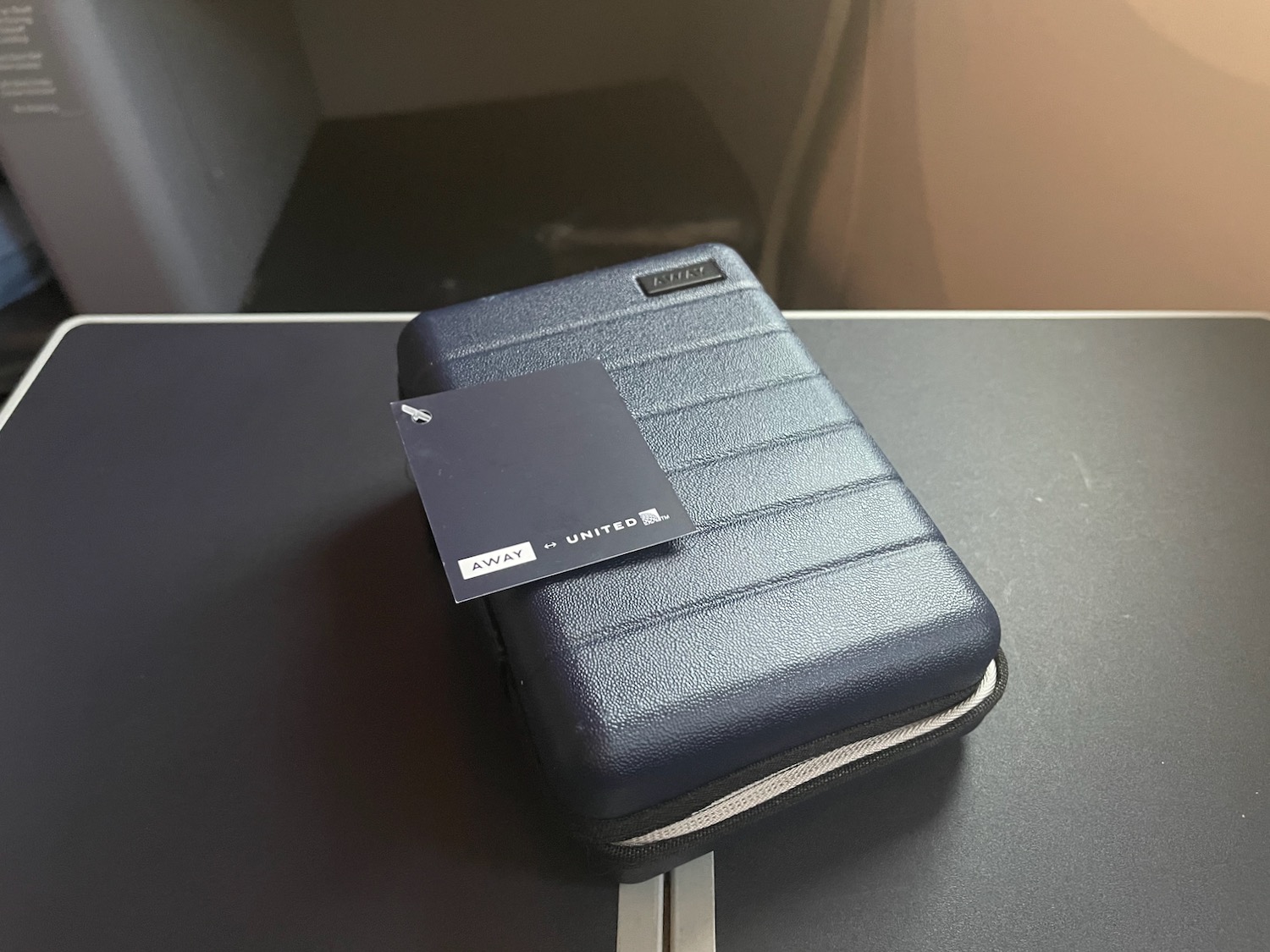 Review: United Airlines Mini Hardshell Suitcase Amenity Kit By Away - Live  and Let's Fly