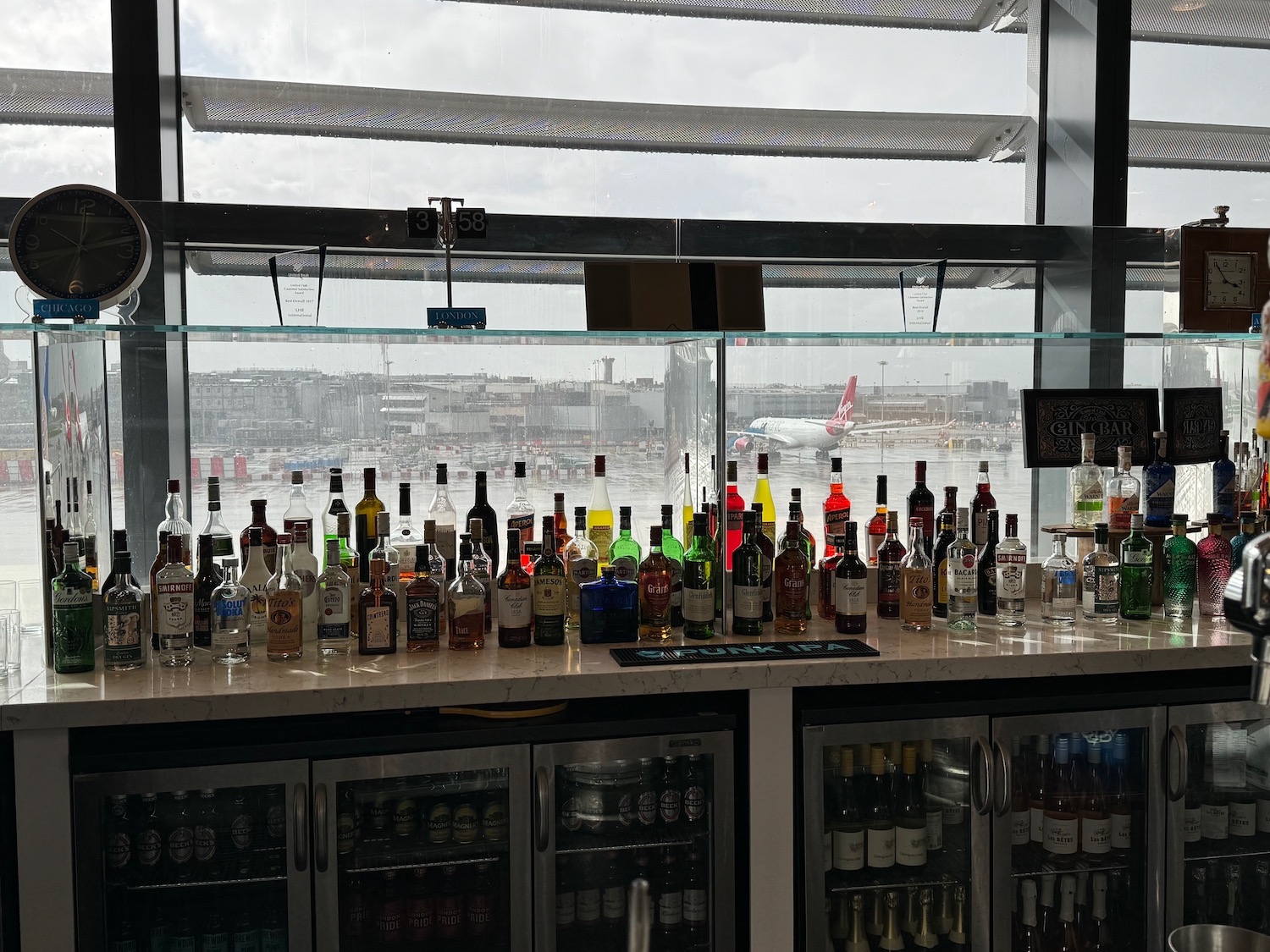 a bar with bottles of alcohol