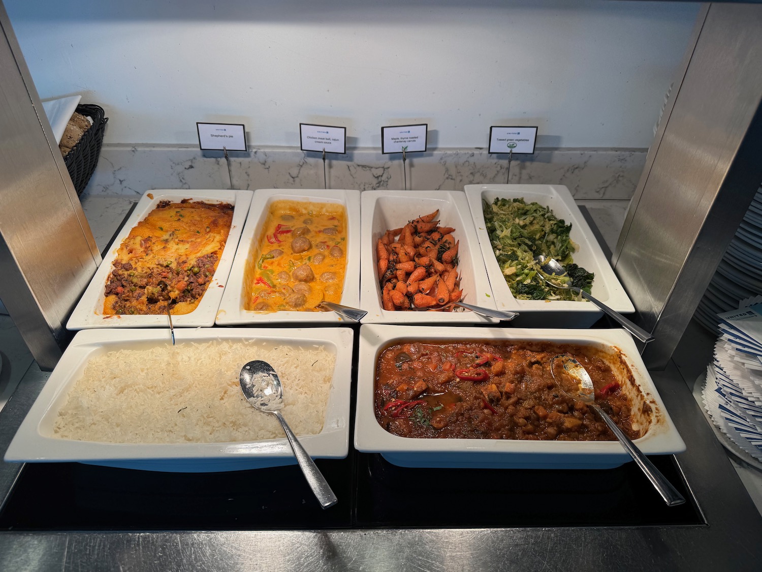 a group of containers of food