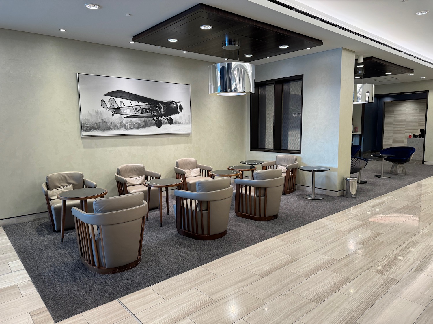 a room with chairs and tables