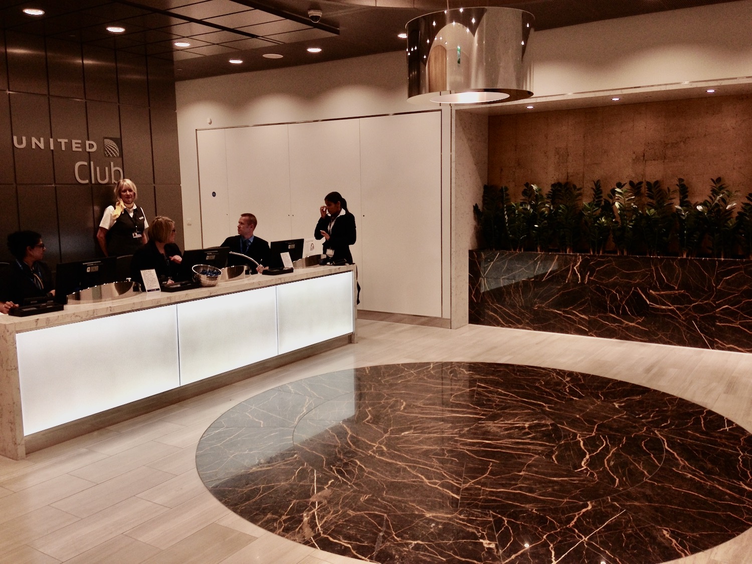 a group of people at a reception desk