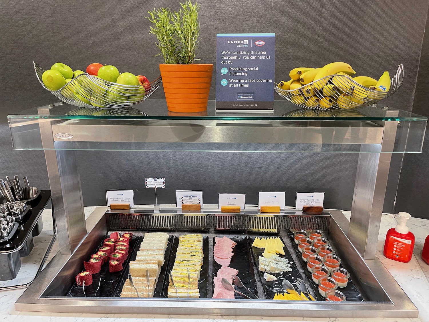 food on a shelf with fruit and vegetables