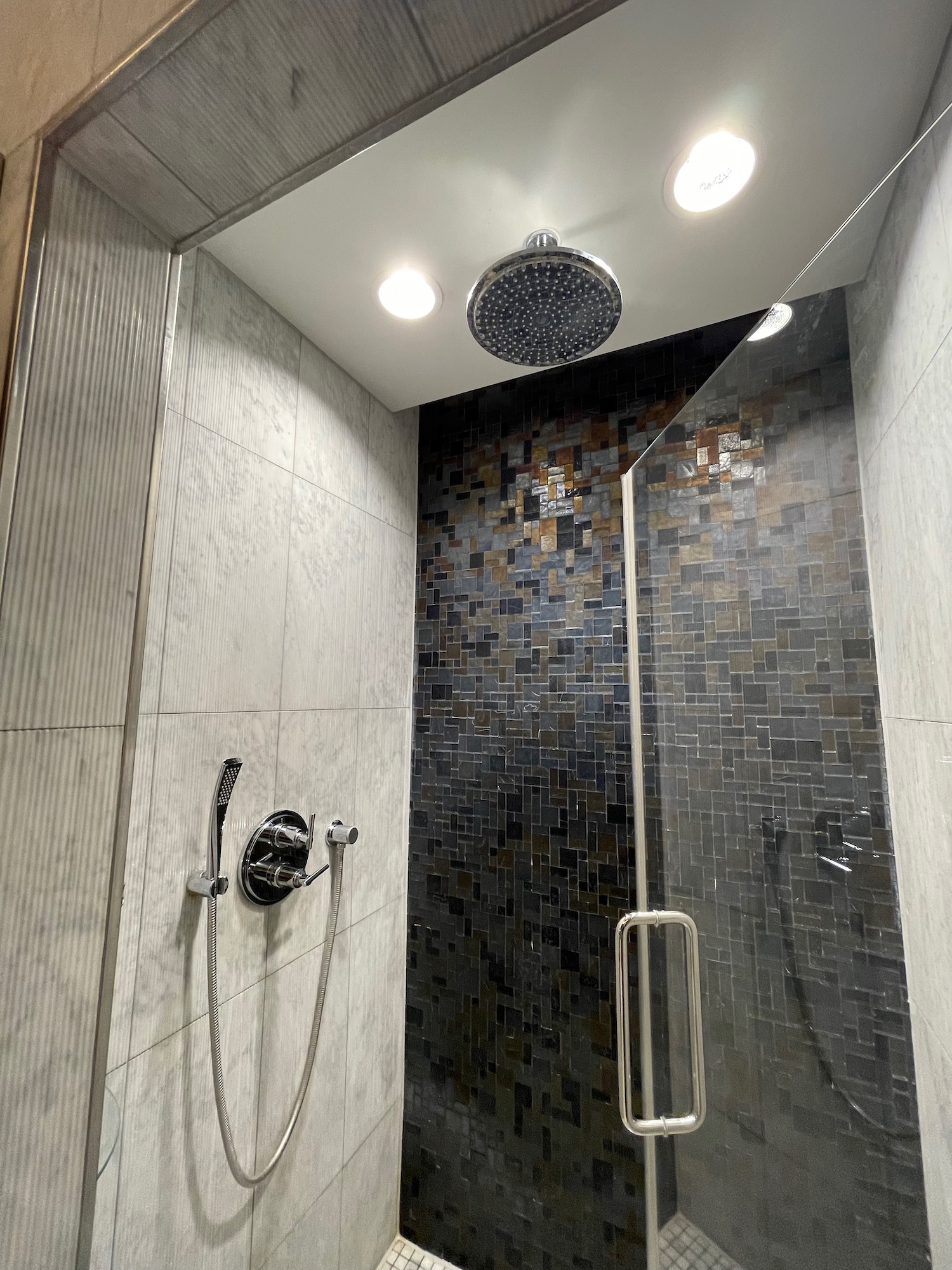 a shower with a shower head