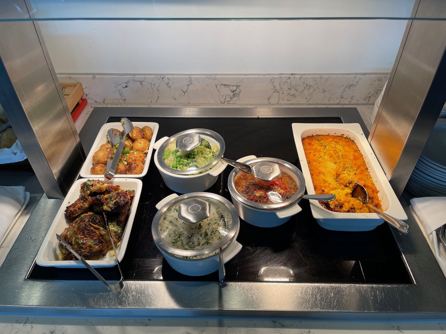 a trays of food on a counter