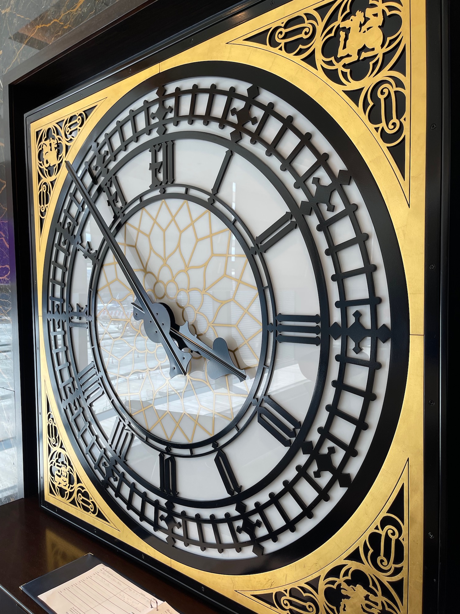 a clock with a gold border