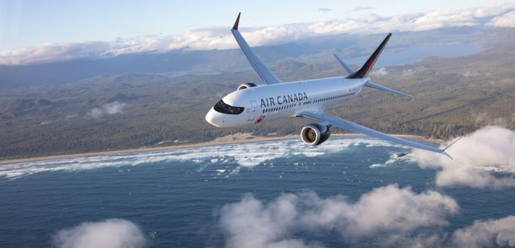 a plane flying over water