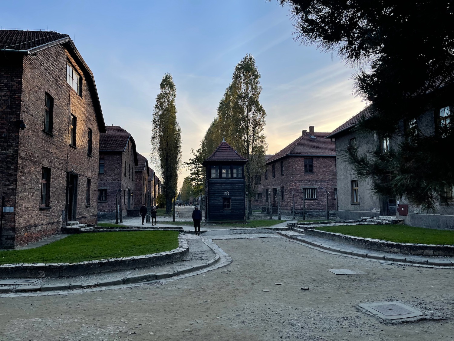 a group of buildings with a small structure in the middle