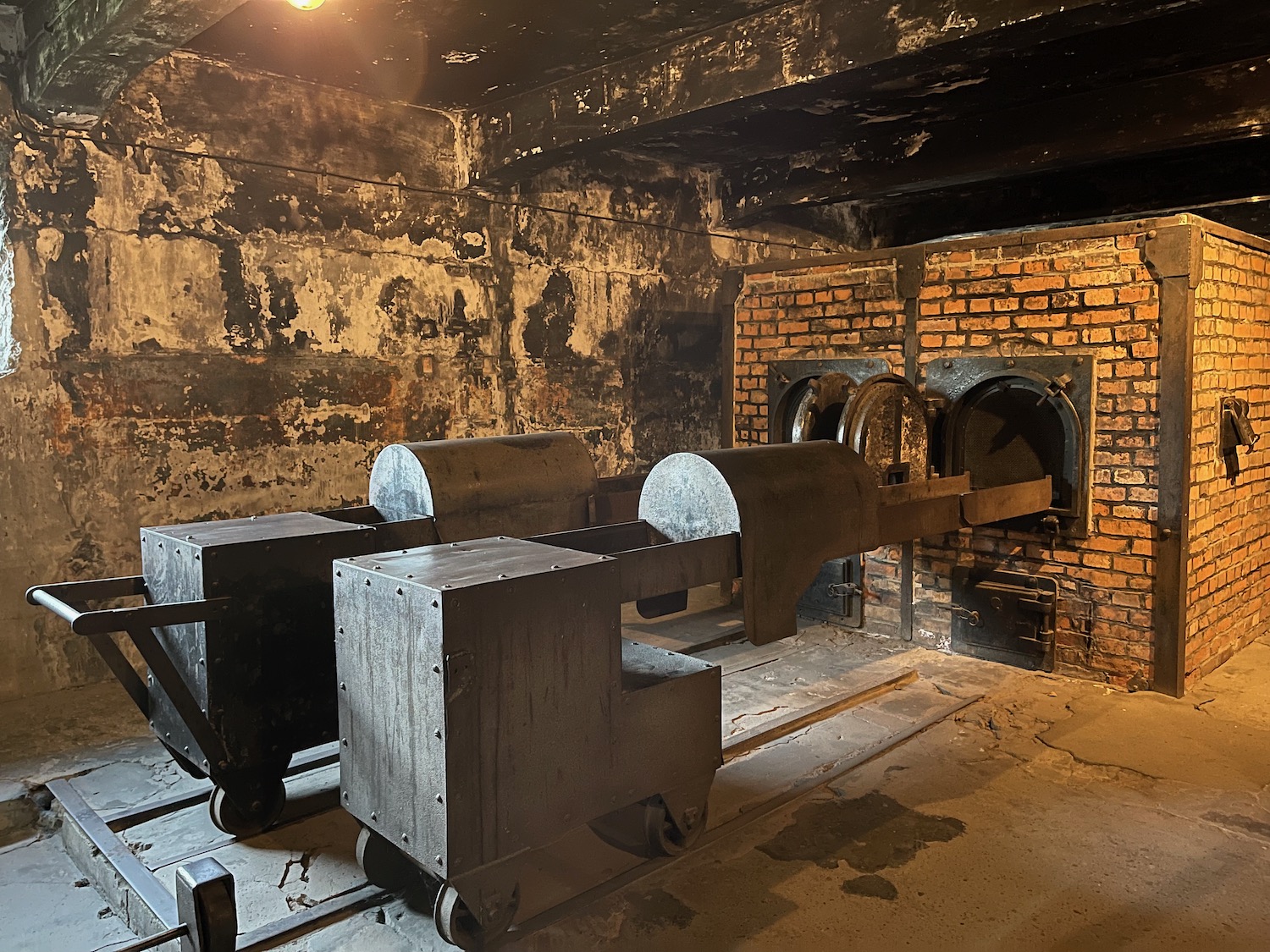 a large metal objects in a brick room