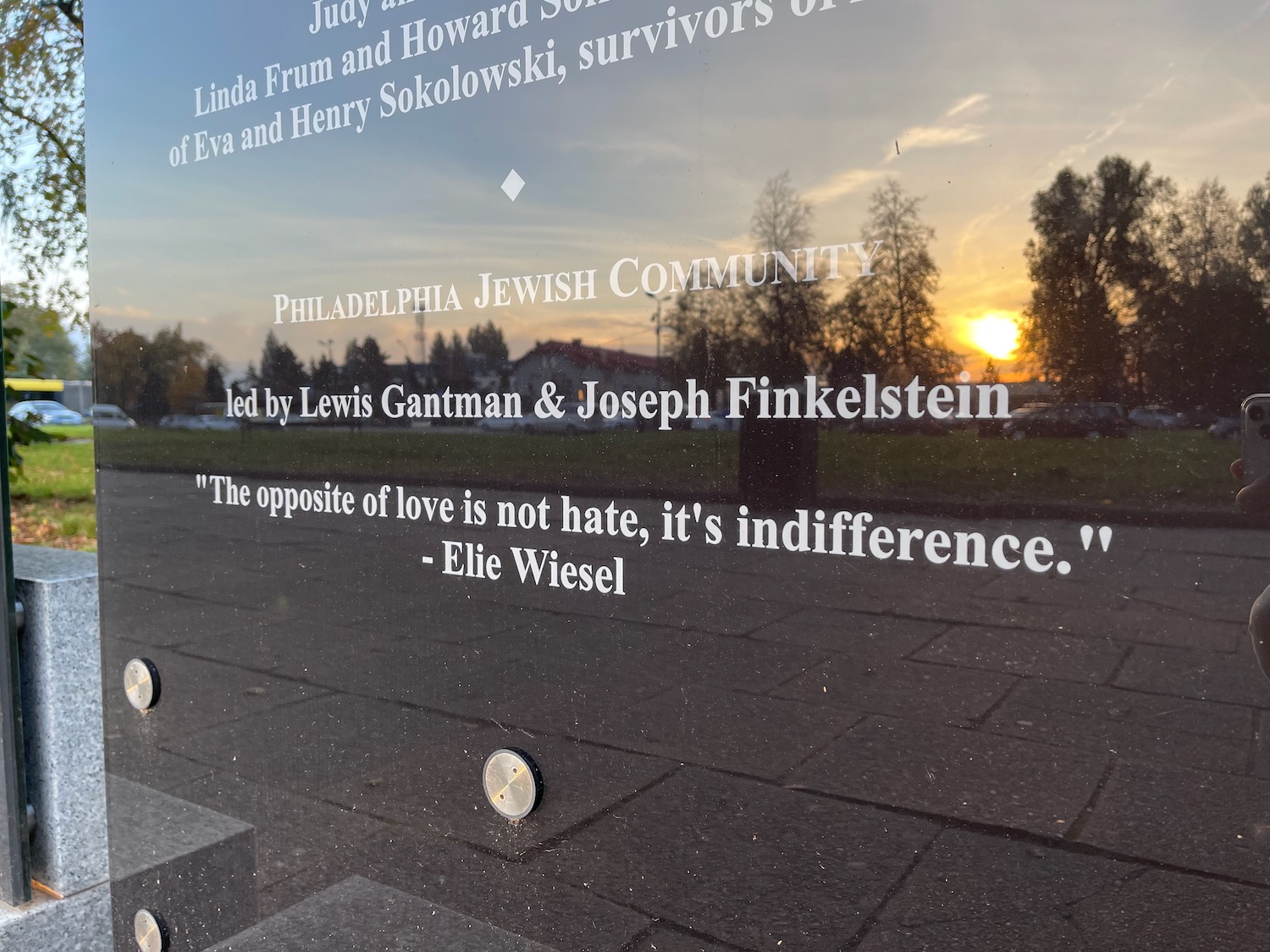 a glass window with a quote on it