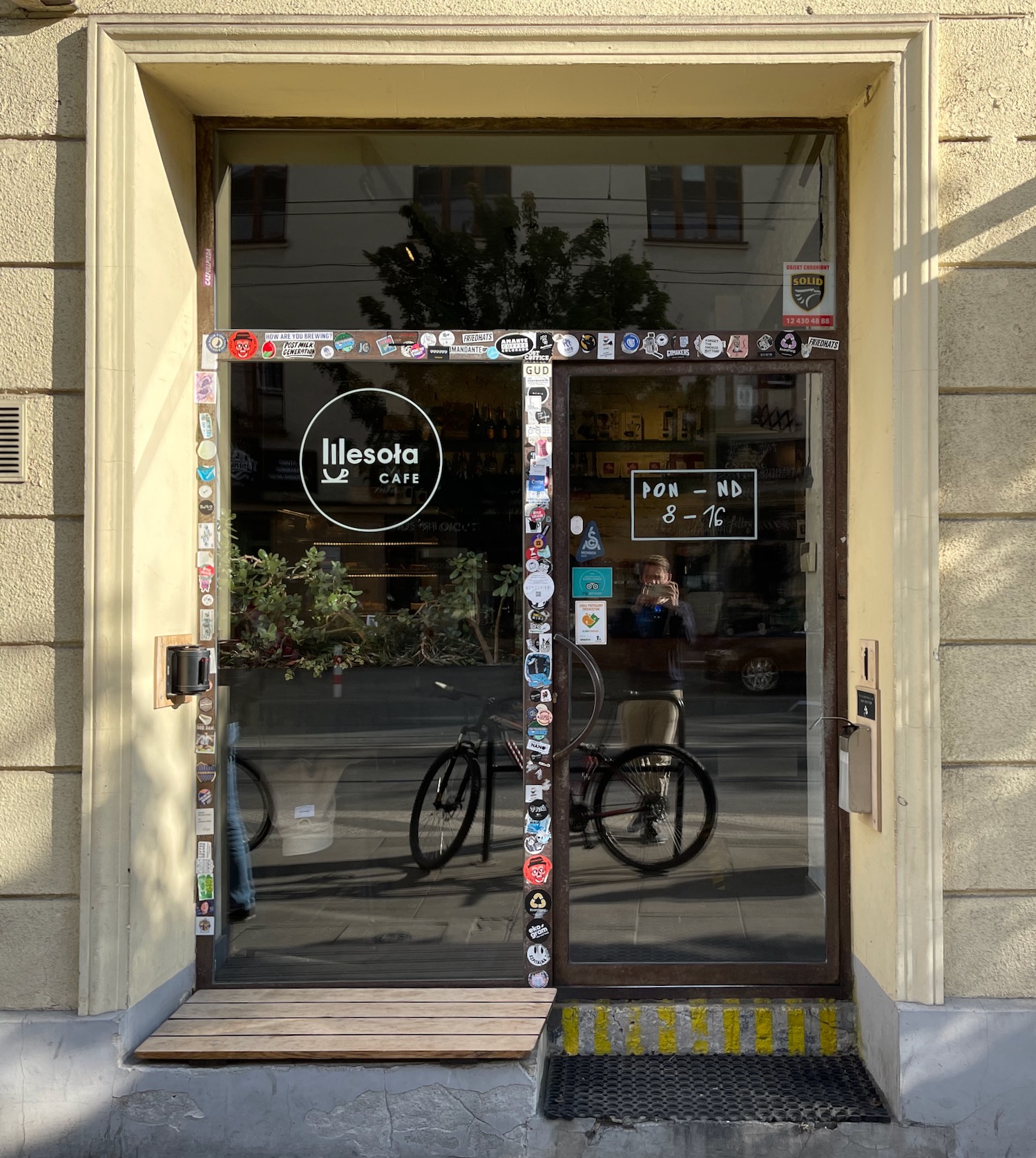 a glass door with stickers on it