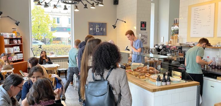 a group of people in a cafe