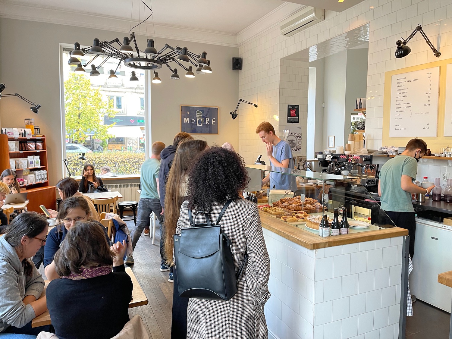 a group of people in a cafe