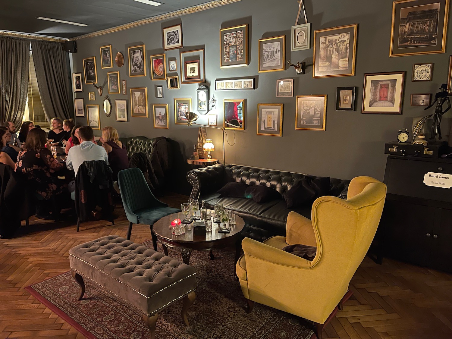 a room with a group of people sitting around a table