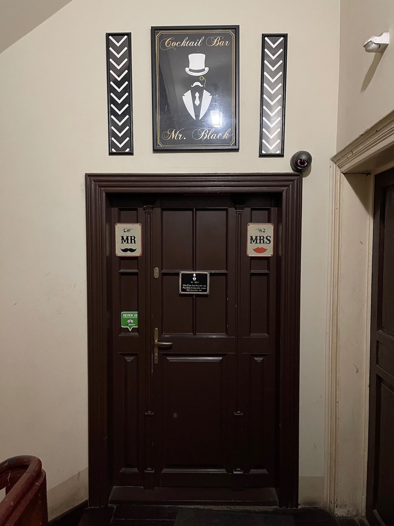 a door with a picture above it