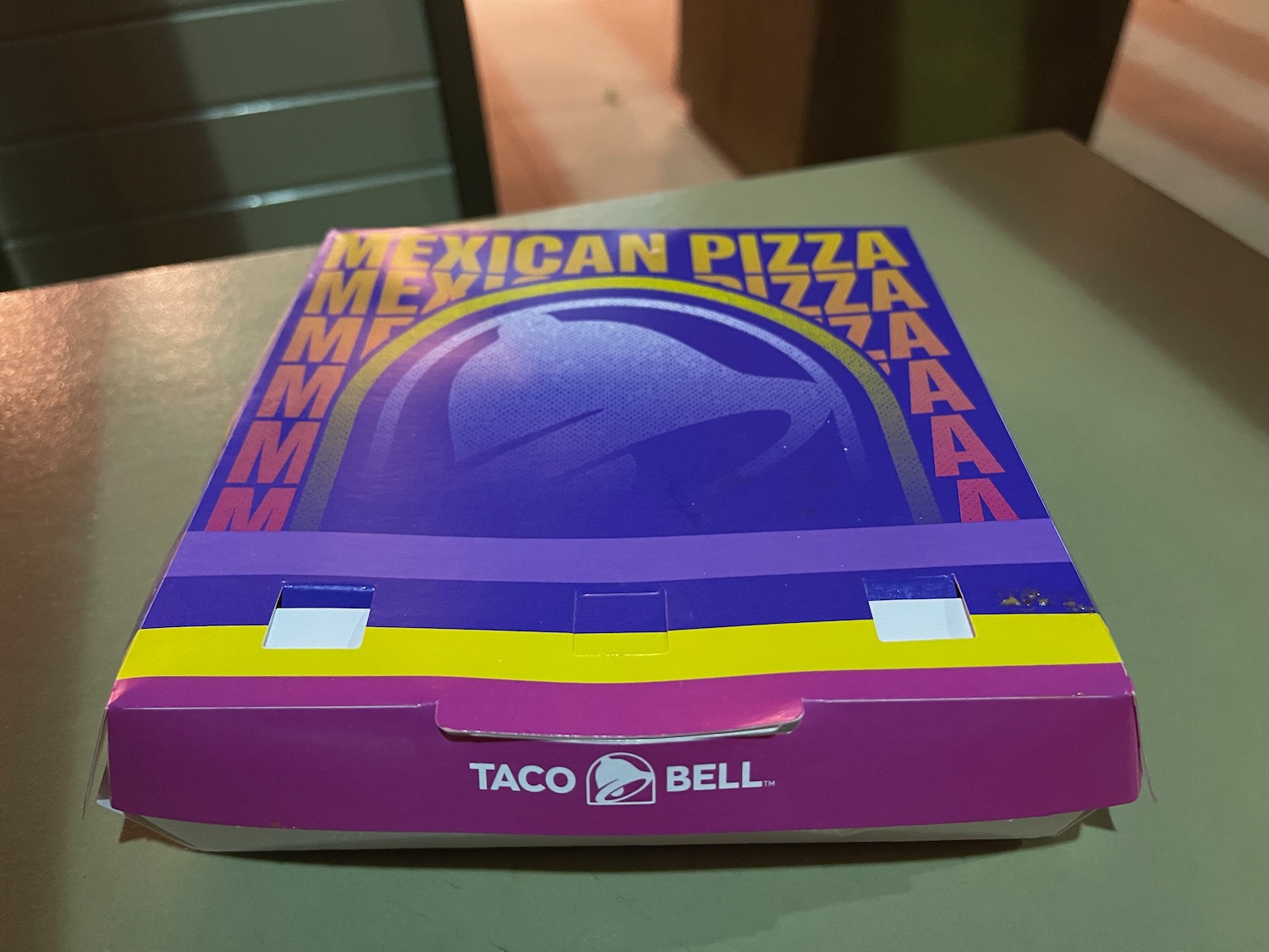 a pizza box on a table
