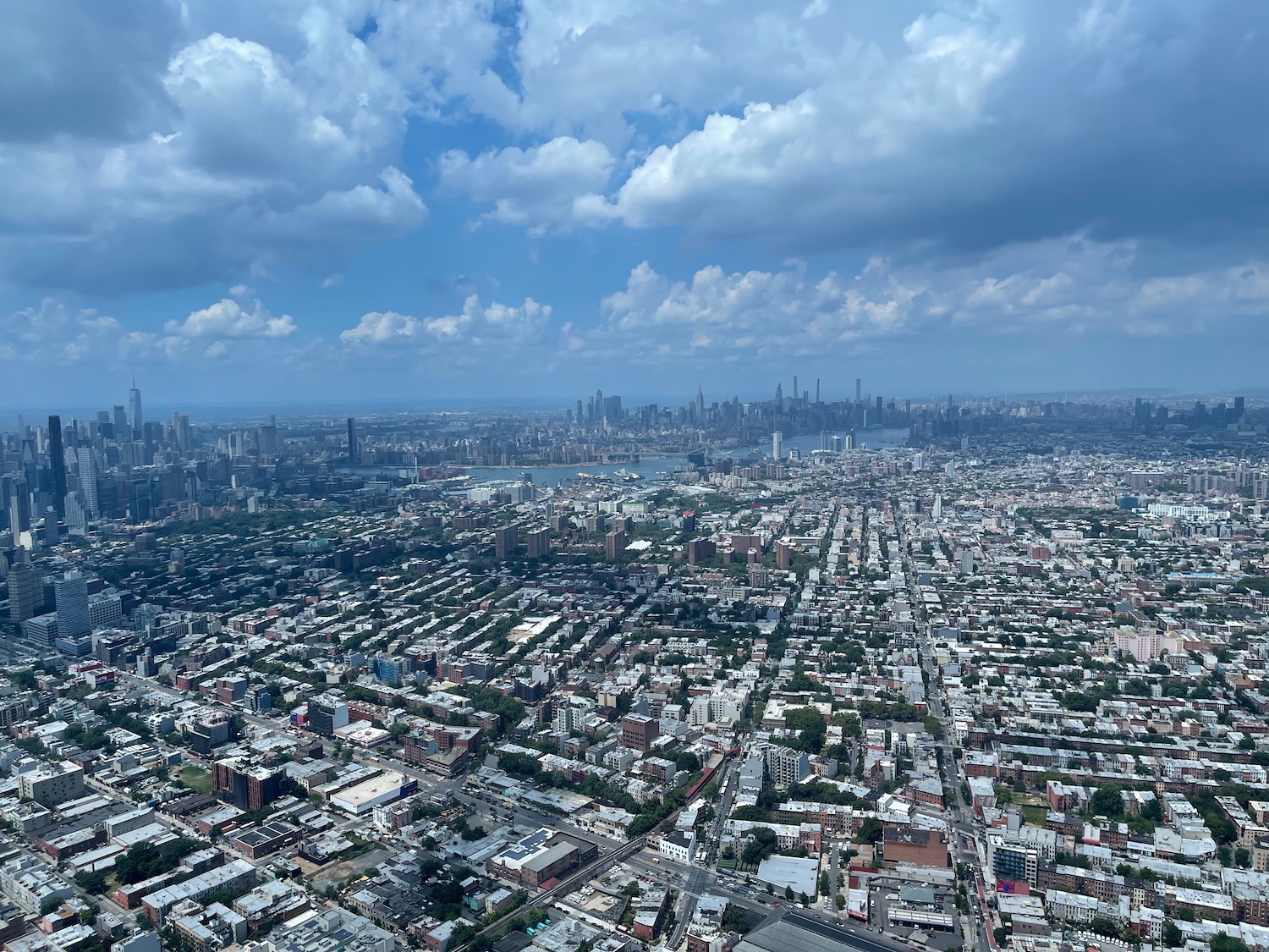 a city with many buildings and a body of water