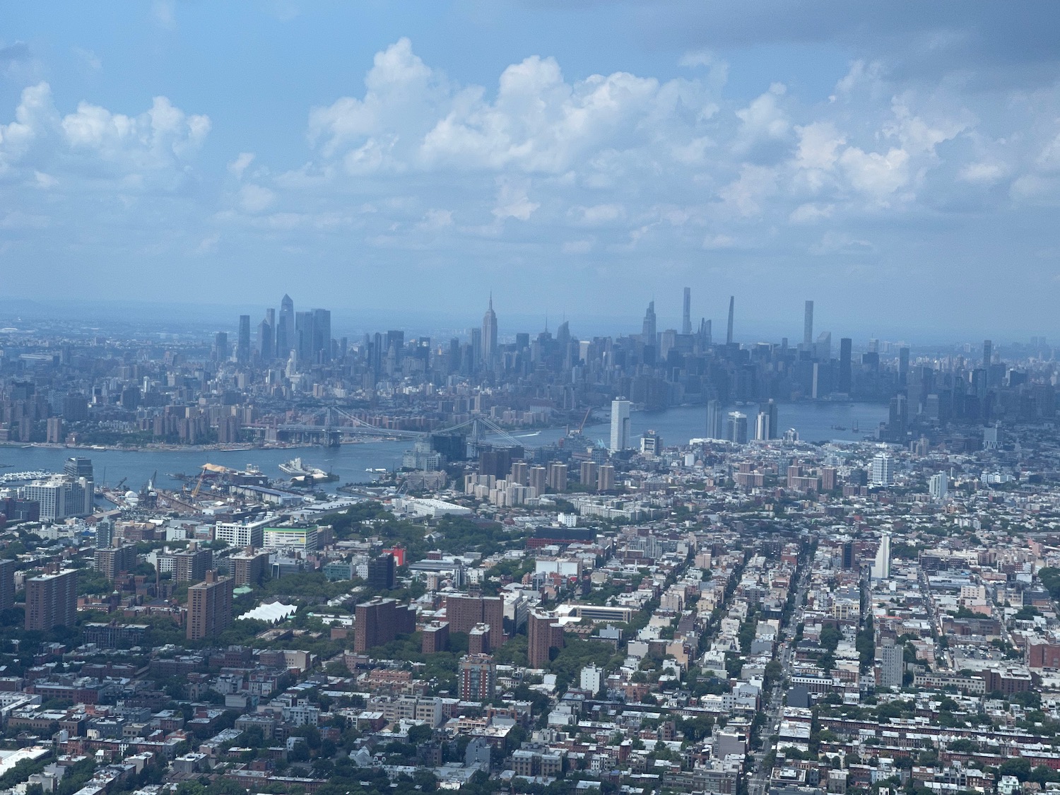 a city with many buildings and a body of water