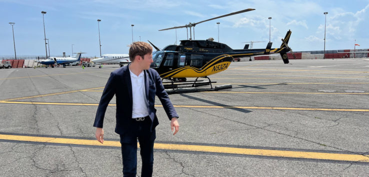 a man walking on a runway