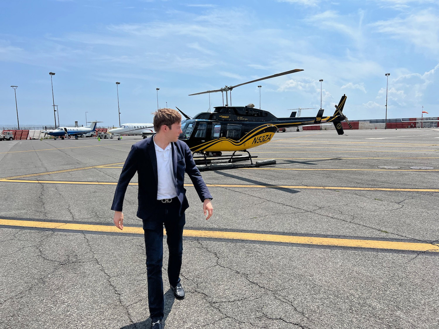 a man walking on a runway