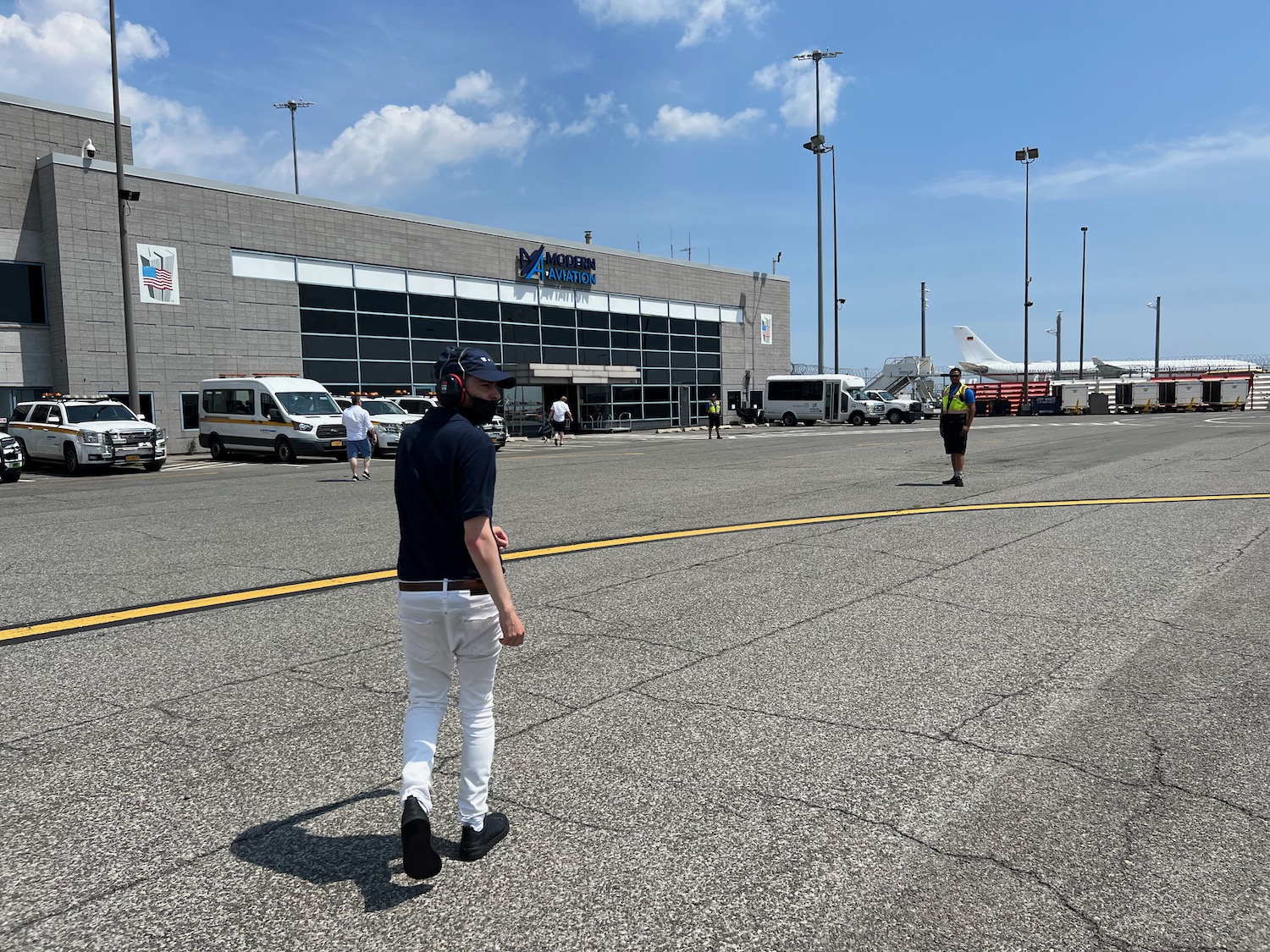 a man walking in a parking lot