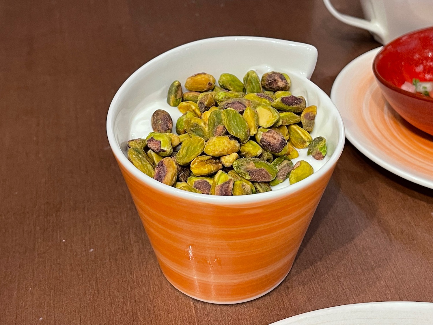 a bowl of food with a saucer