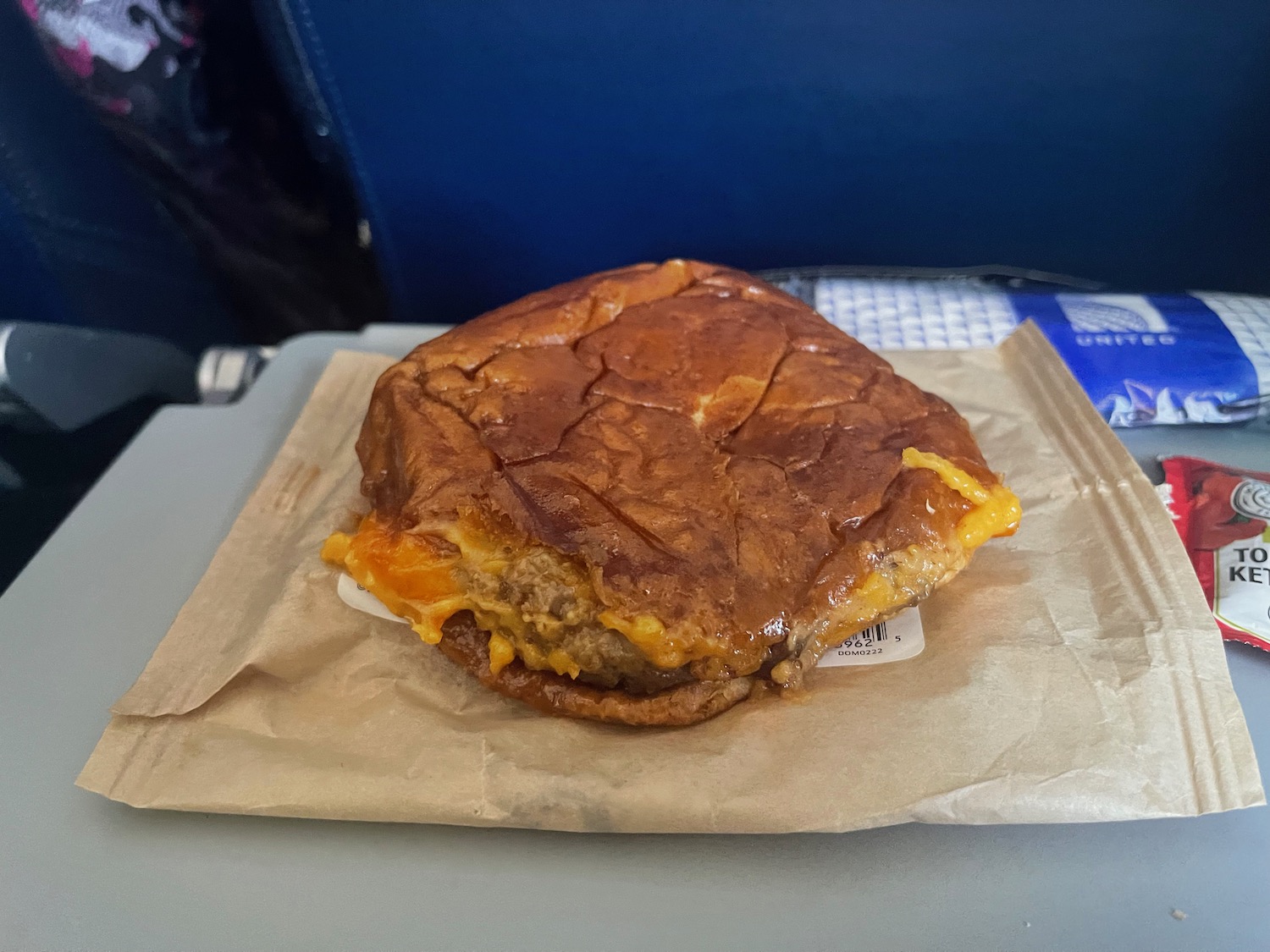 a burger on a paper wrapper