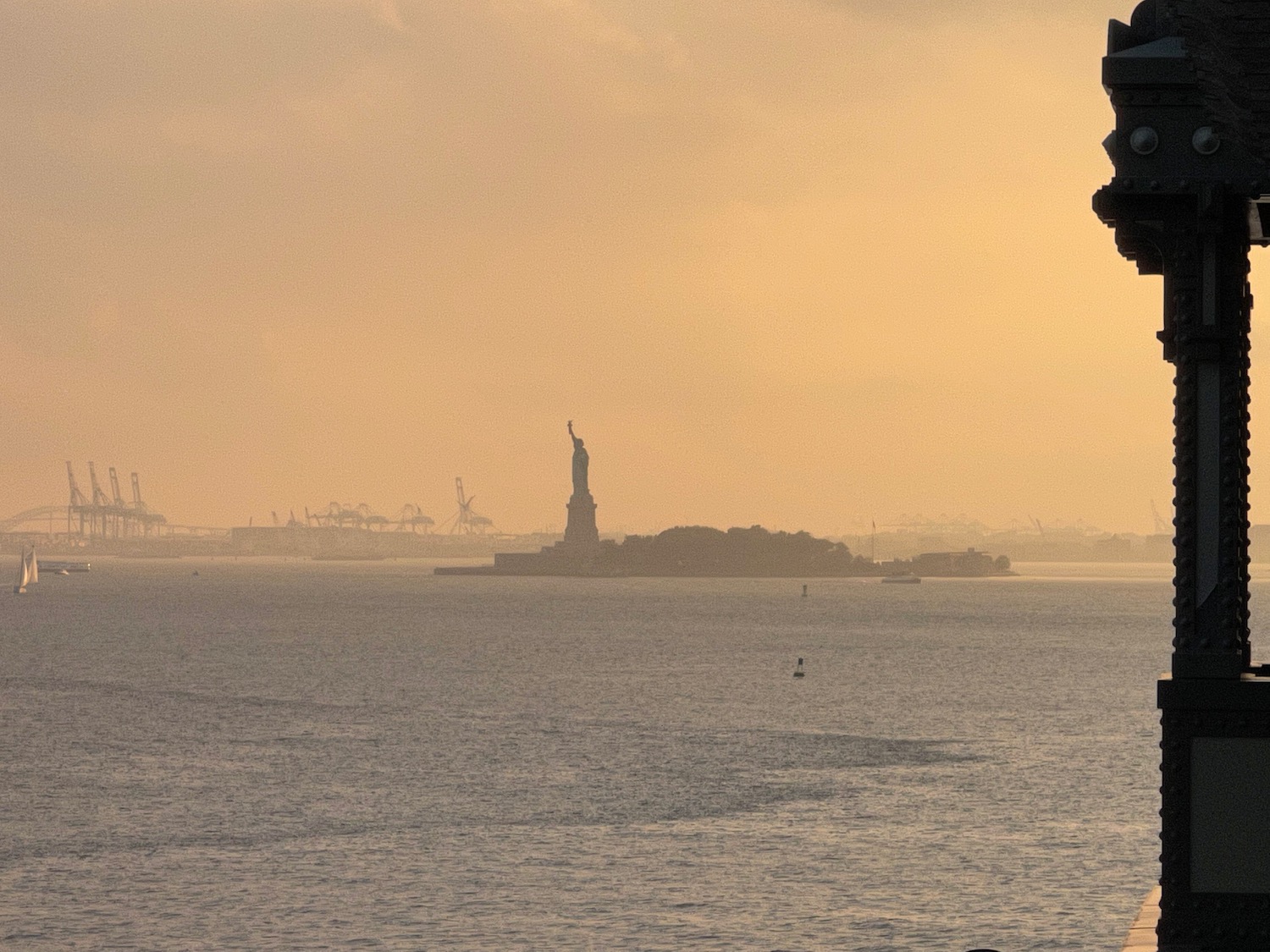 a statue of liberty in the distance