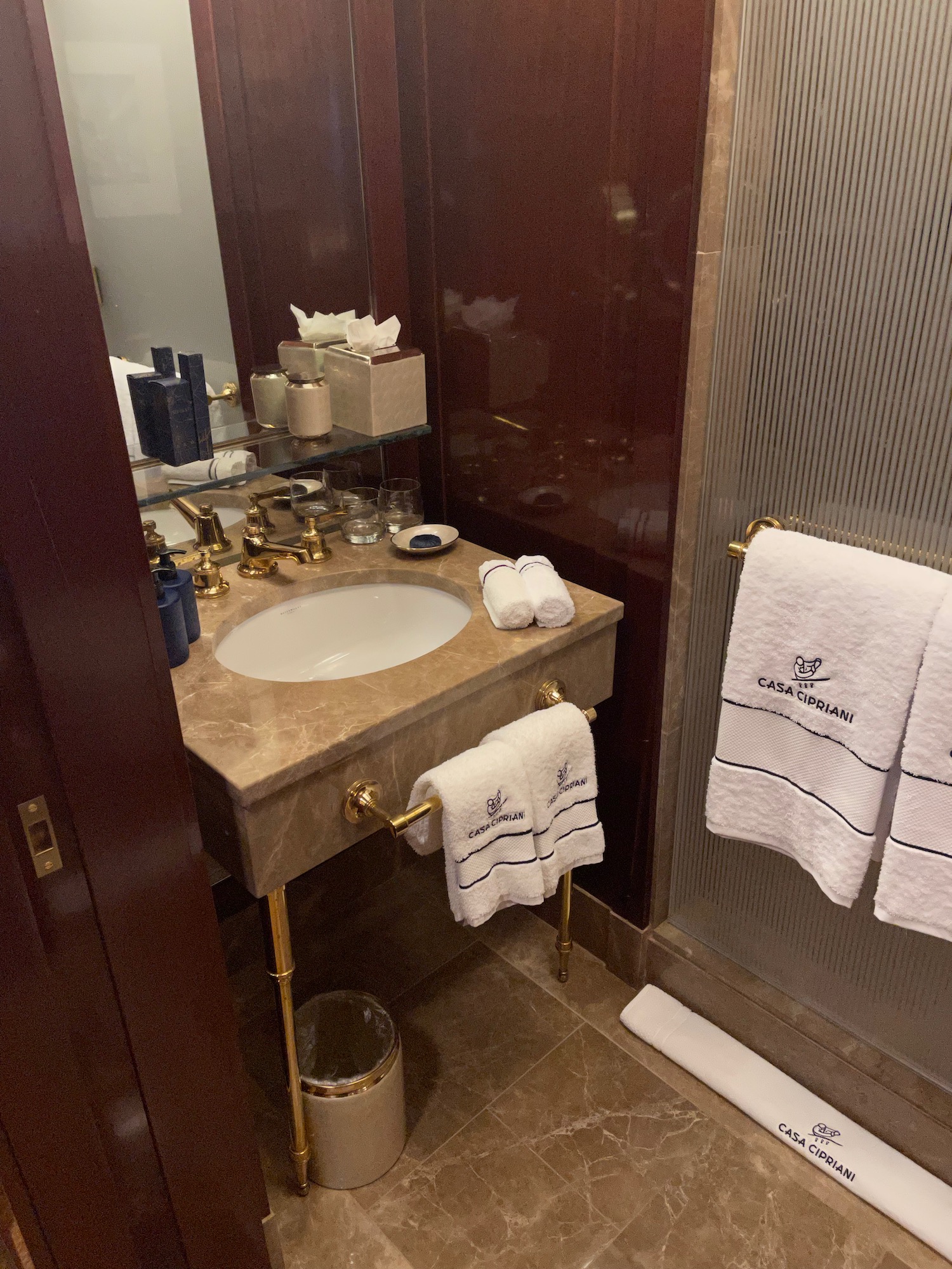 a bathroom with a sink and towels