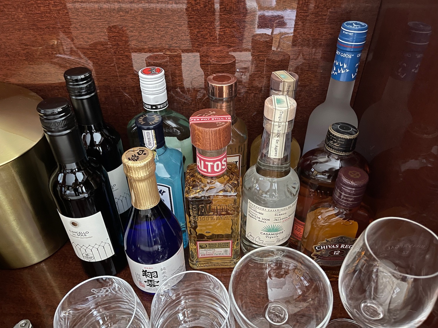 a group of bottles and glasses