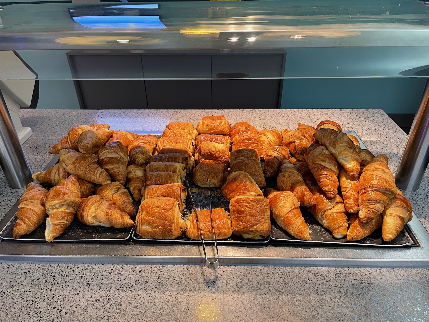 a tray of croissants on a counter