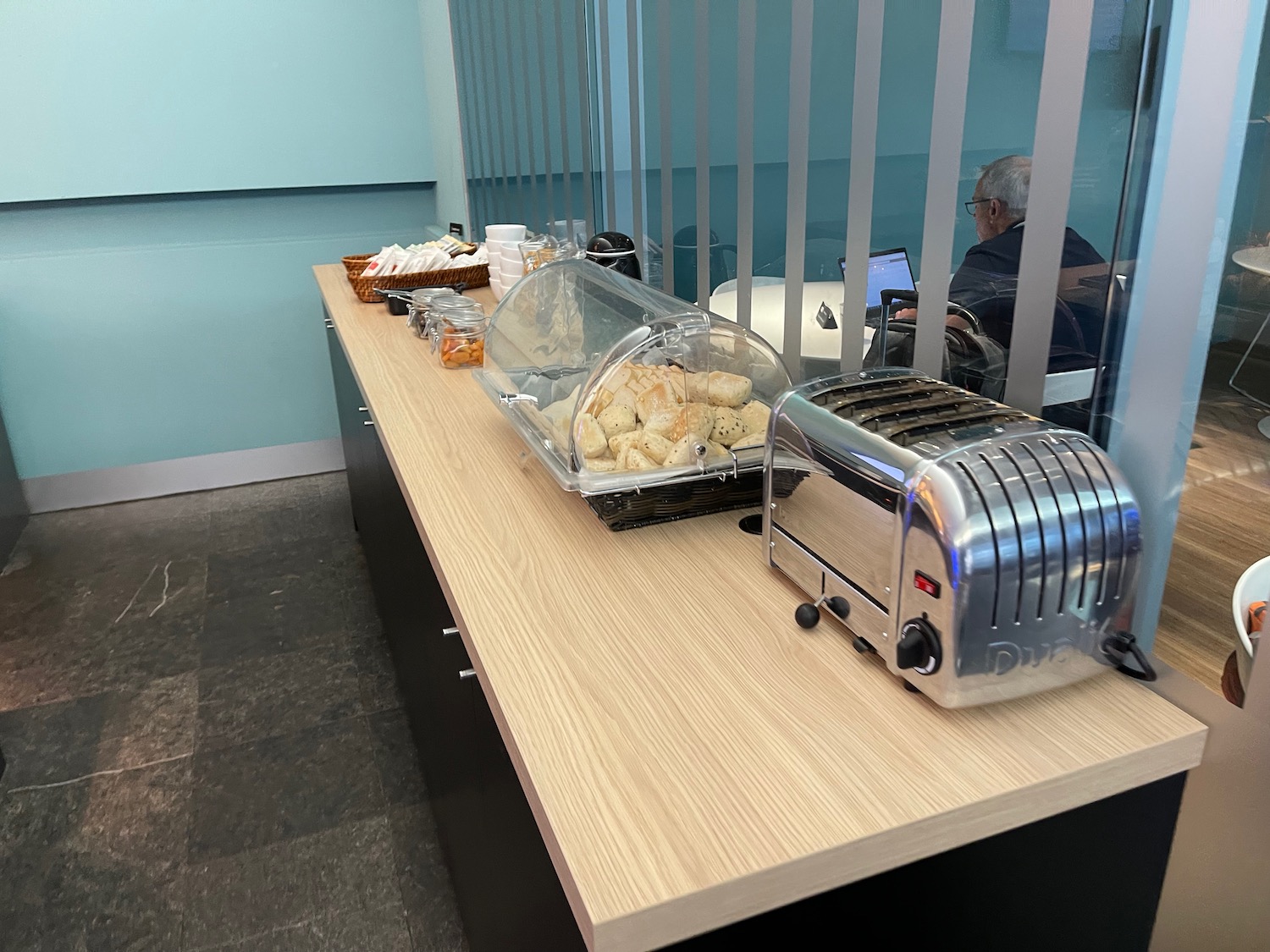 a toaster and bread on a counter