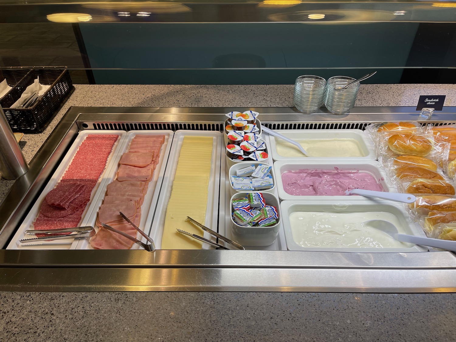 a trays of food in a buffet