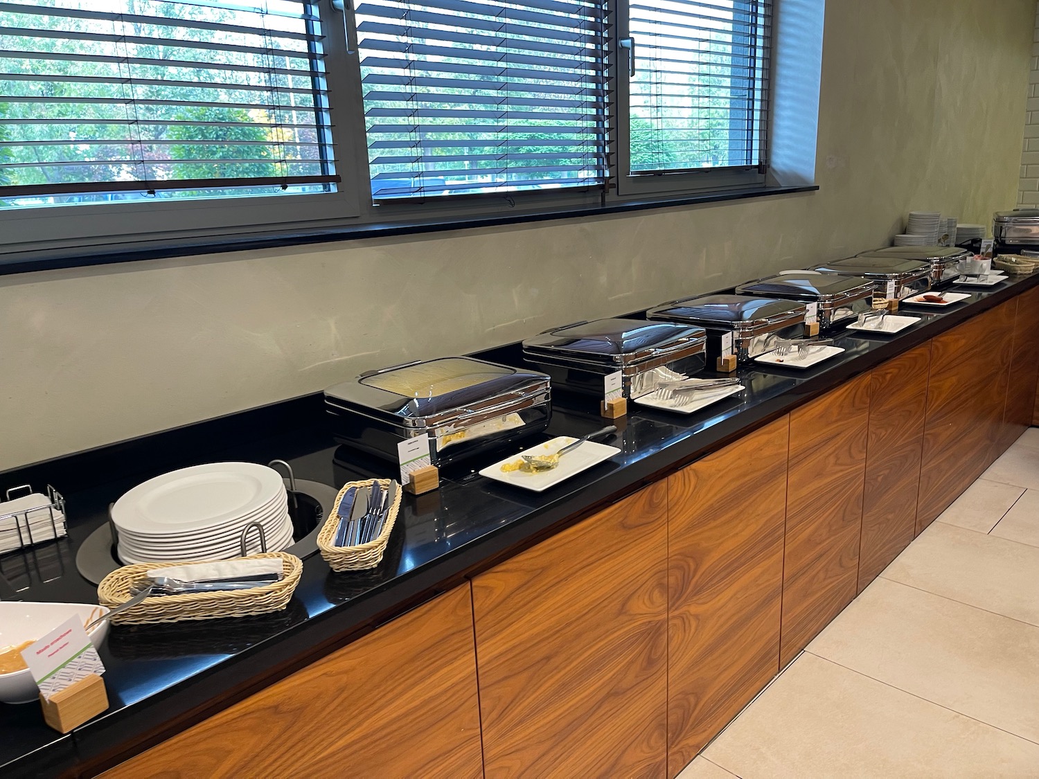 a buffet with plates and plates on it