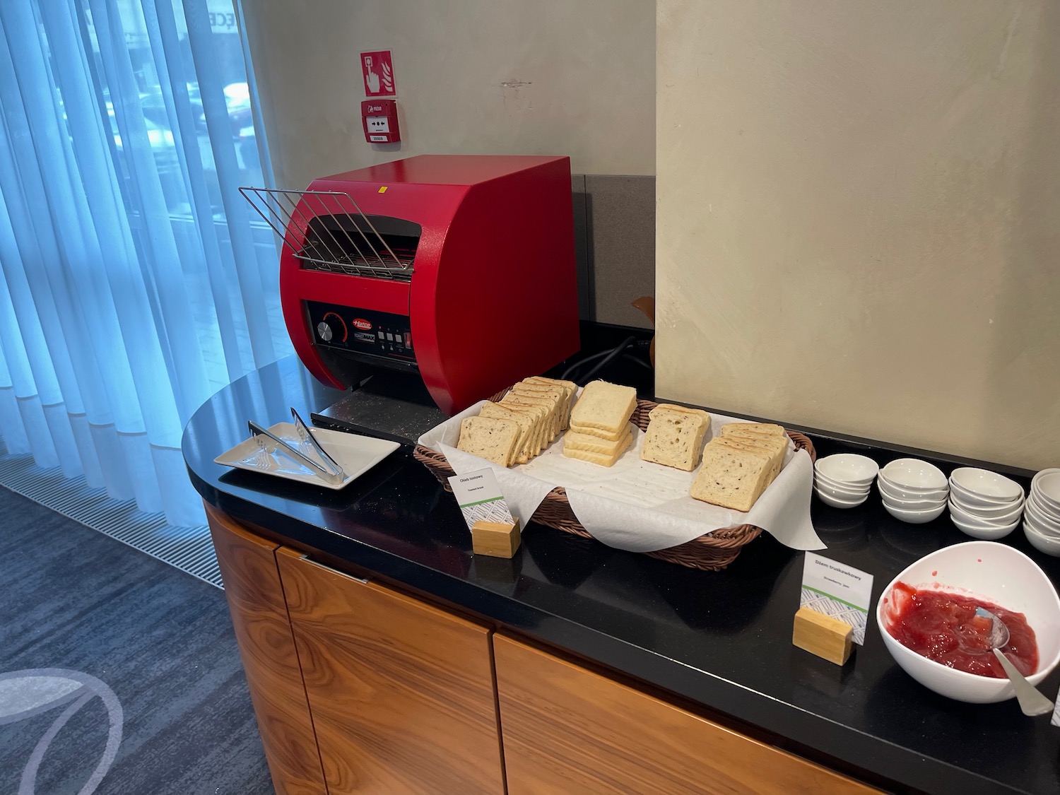 a toaster and bread on a counter