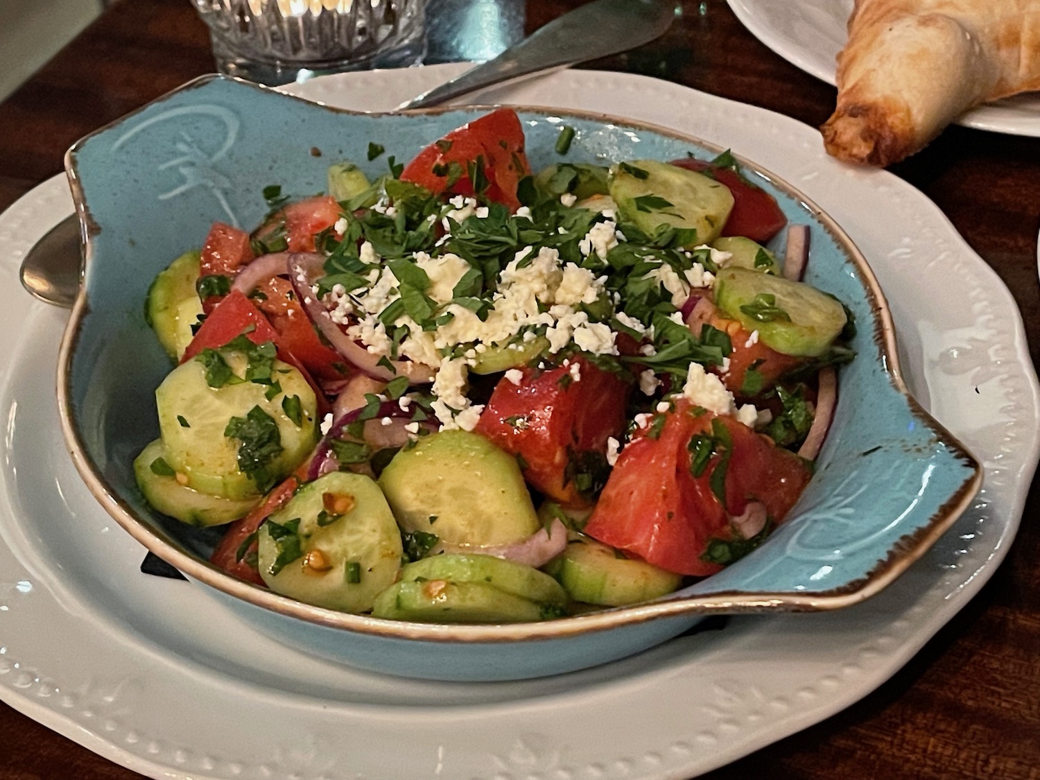 a bowl of salad on a plate