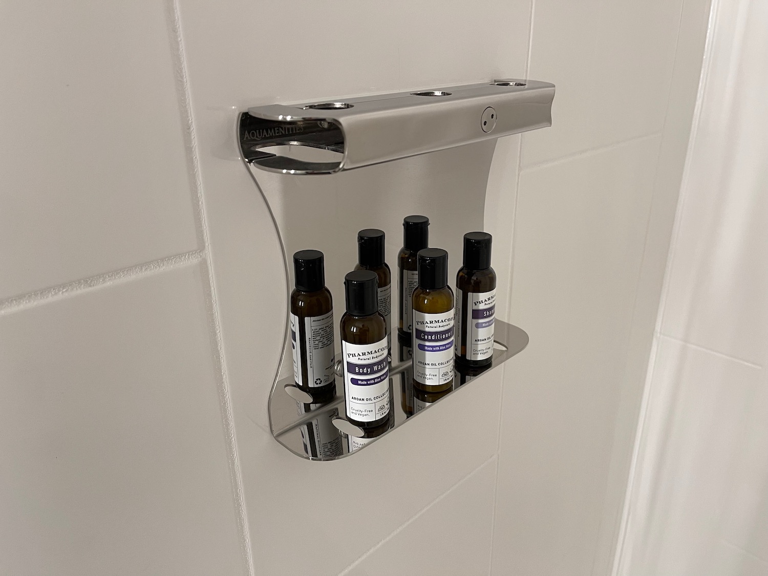 a group of small bottles on a shelf