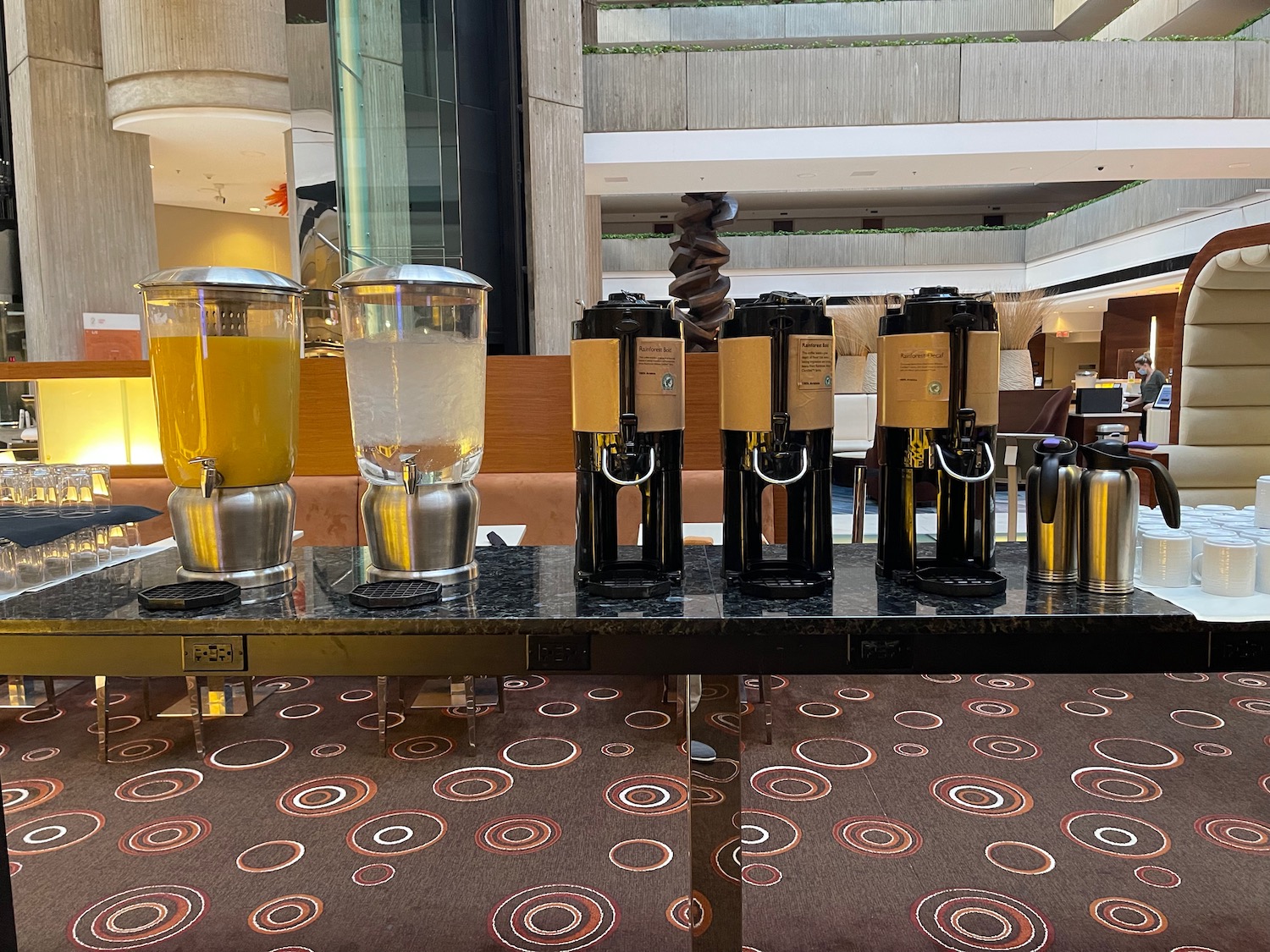 a group of coffee machines on a table