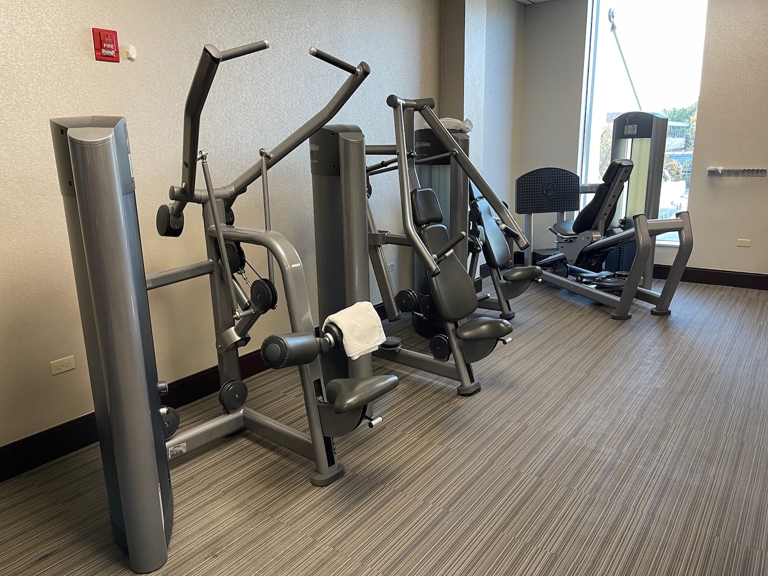 a group of exercise equipment in a room