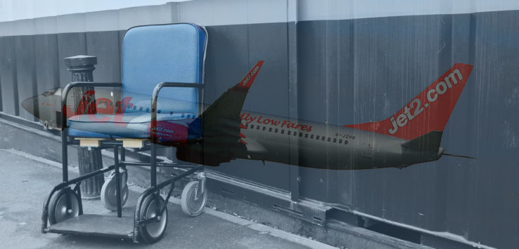 a blue chair with a plane painted on it