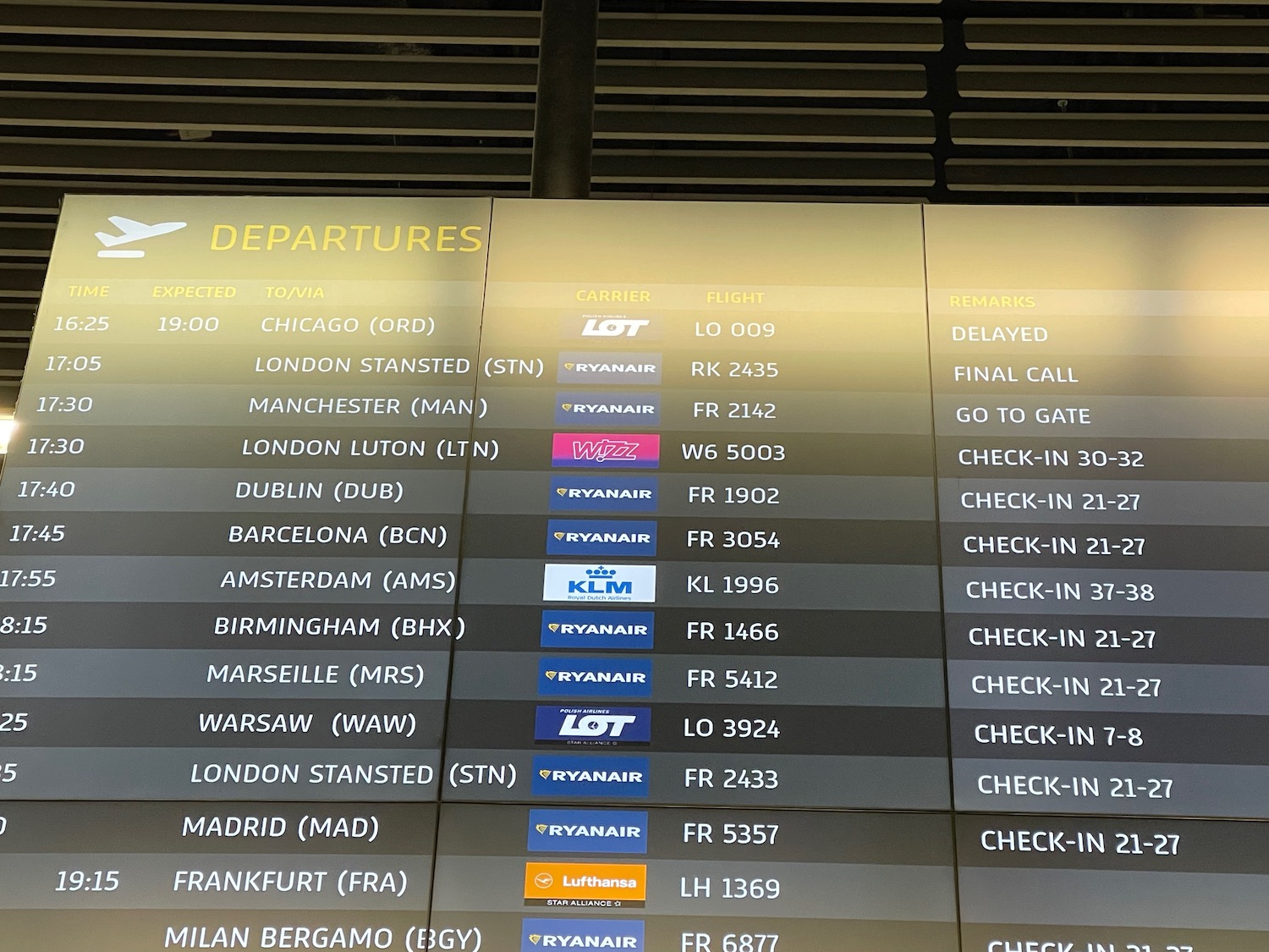 a sign with different airport names