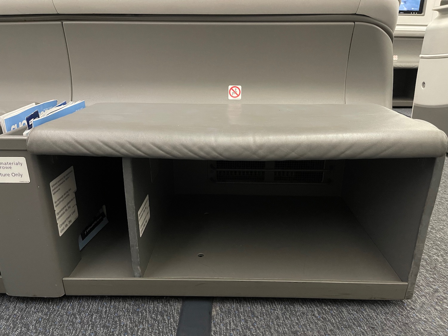 a grey rectangular object with a shelf