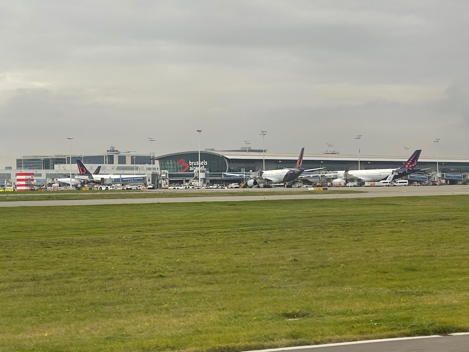 a group of airplanes on a runway